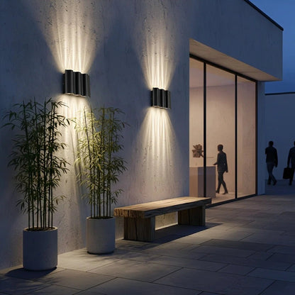 Outdoor wall sconce featuring a stylish matte black aluminum design, showcasing a captivating water wave lighting effect with up and down illumination, perfect for enhancing outdoor spaces 2