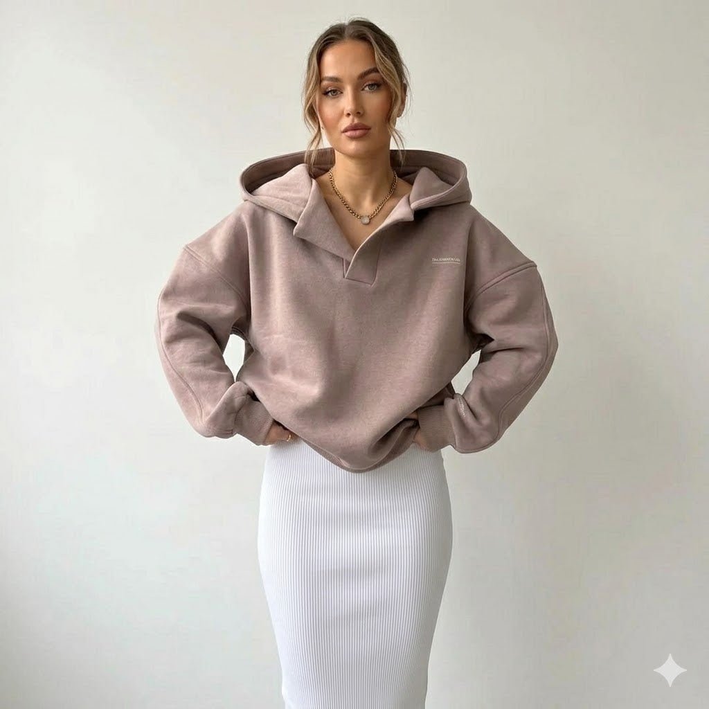 Oversized hoodie for women featuring a crossover hood, made from a soft cotton-polyester blend, perfect for casual lounge wear. 0