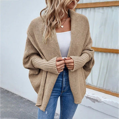 Oversized knit cardigan featuring a shawl collar and batwing sleeves, perfect for casual everyday layering for women. 6