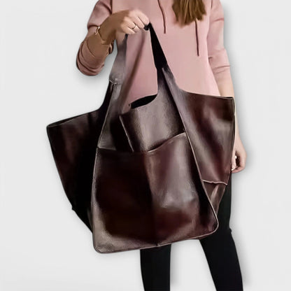 Oversized shoulder bag made of durable PU leather, featuring a versatile design and elegant style, perfect for everyday use. 8