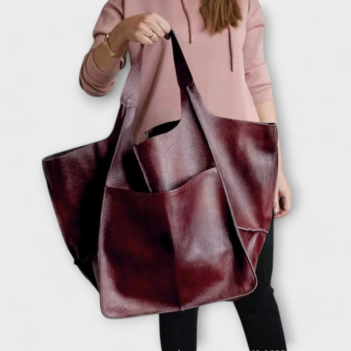 Oversized shoulder bag made of durable PU leather, featuring a versatile design and elegant style, perfect for everyday use. 6