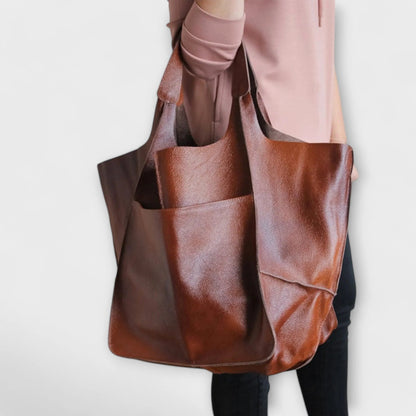 Oversized shoulder bag made of durable PU leather, featuring a versatile design and elegant style, perfect for everyday use. 4