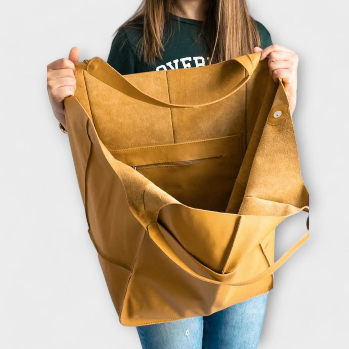 Oversized shoulder bag made of durable PU leather, featuring a versatile design and elegant style, perfect for everyday use. 2