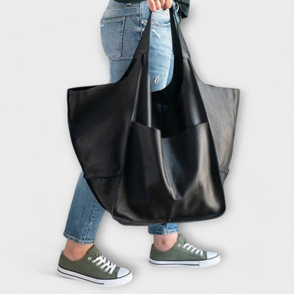 Oversized shoulder bag made of durable PU leather, featuring a versatile design and elegant style, perfect for everyday use. 9