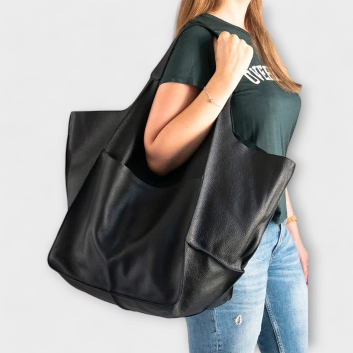 Oversized shoulder bag made of durable PU leather, featuring a versatile design and elegant style, perfect for everyday use. 3
