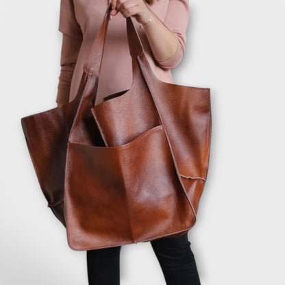 Oversized shoulder bag made of durable PU leather, featuring a versatile design and elegant style, perfect for everyday use. 10