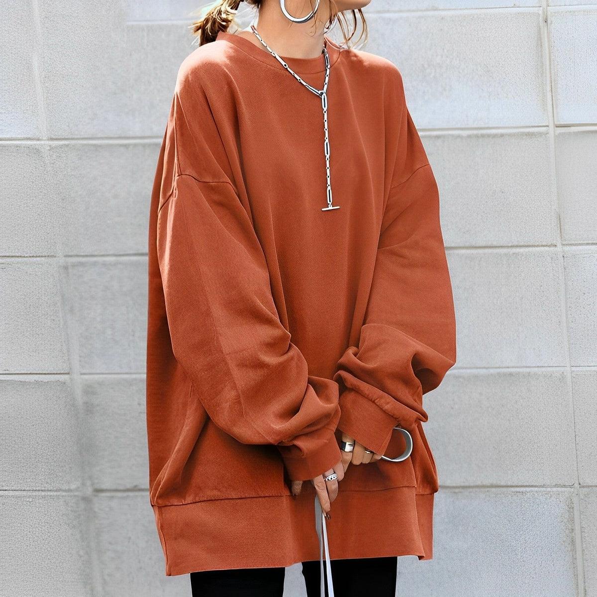 Oversized women's sweatshirt featuring a soft cotton-polyester blend, designed with a minimalist casual aesthetic and relaxed fit for ultimate comfort. 4