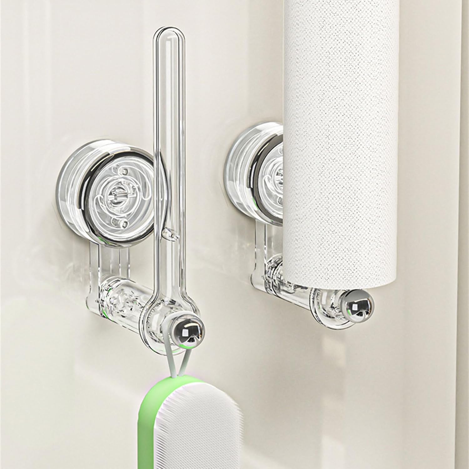 Transparent plastic wall-mounted paper towel holder with a rotatable suction cup, ideal for kitchen organization and easy access to towels. 2