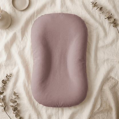 Pastel Baby Lounger Nest featuring breathable materials and raised edges for enhanced comfort and safety. 5