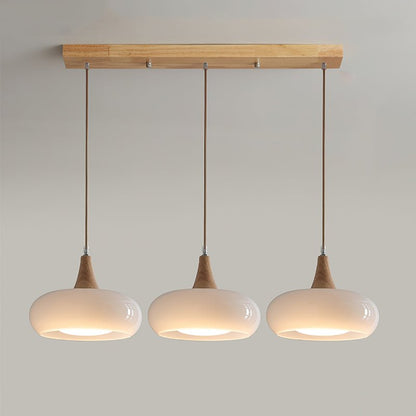 Pendant lamp featuring adjustable suspension with elegant glass shades, designed with a rustic wooden beam for a stylish and modern lighting solution. 10