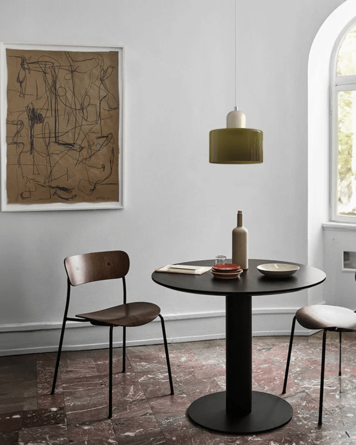 Modern pendant lamp featuring a soft glass shade in earthy tones, showcasing a sculptural design that adds a contemporary touch to any space. 8