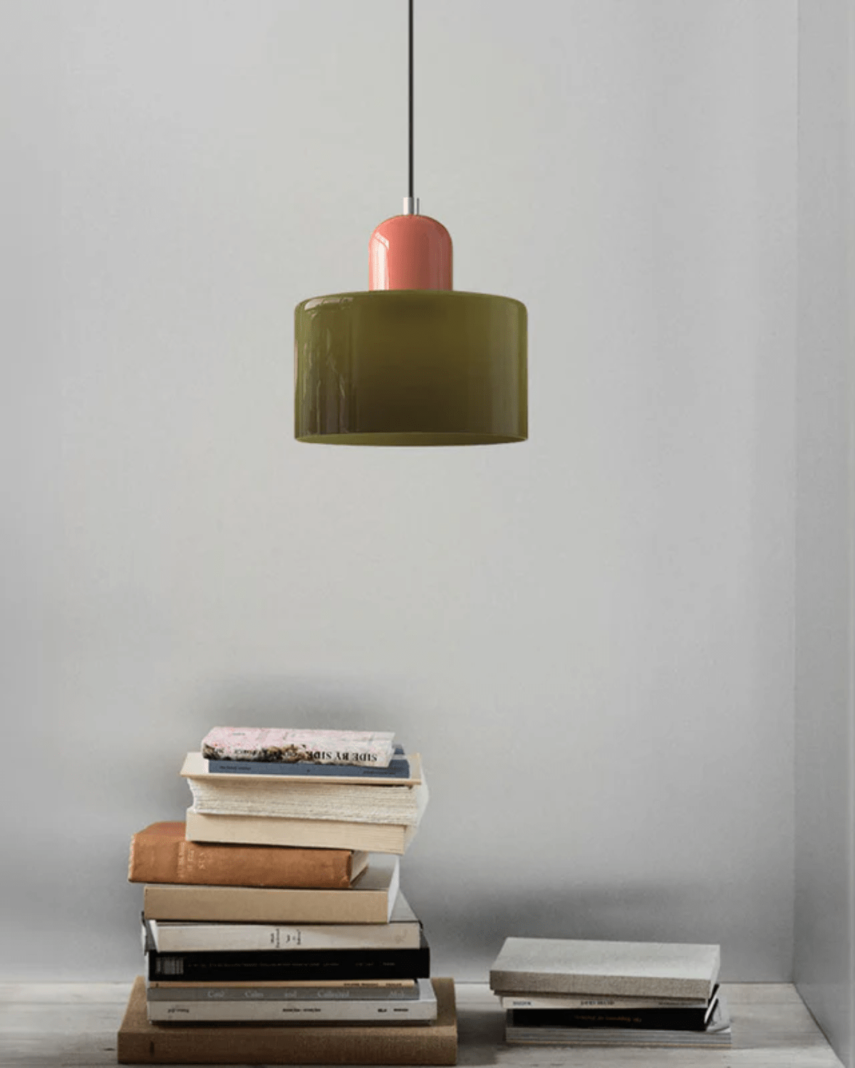 Modern pendant lamp featuring a soft glass shade in earthy tones, showcasing a sculptural design that adds a contemporary touch to any space. 3