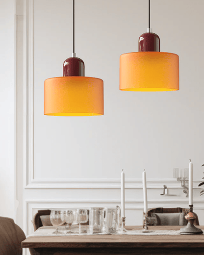 Modern pendant lamp featuring a soft glass shade in earthy tones, showcasing a sculptural design that adds a contemporary touch to any space. 2