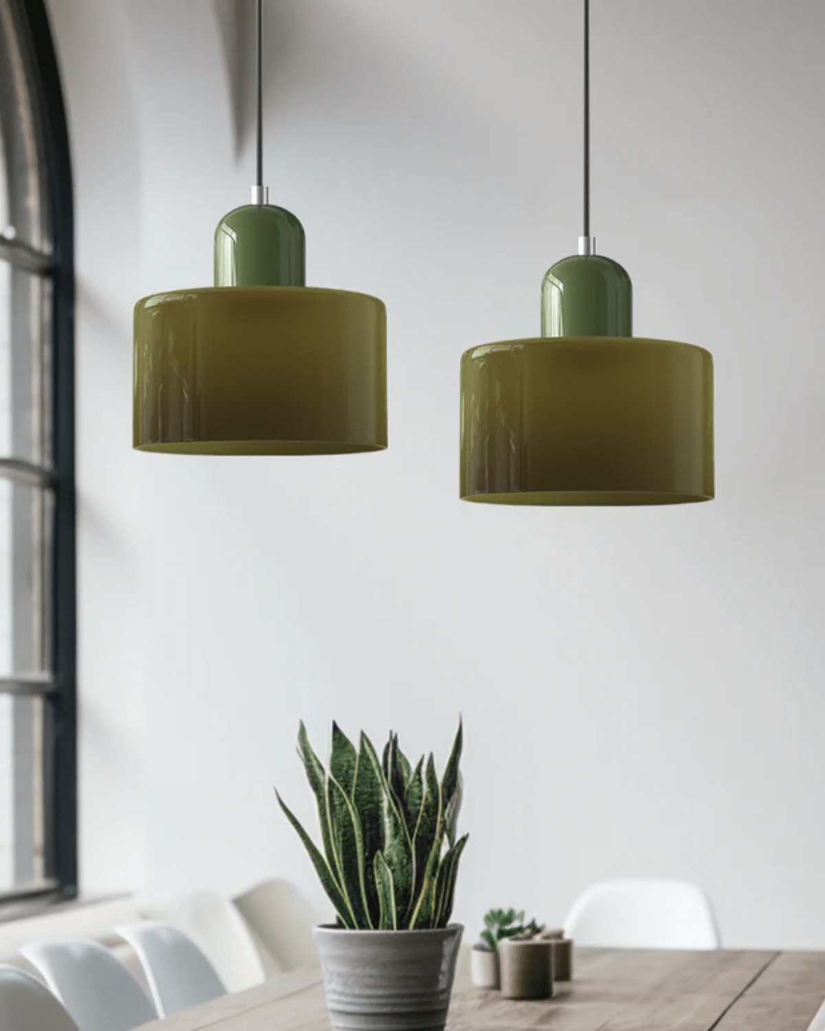 Modern pendant lamp featuring a soft glass shade in earthy tones, showcasing a sculptural design that adds a contemporary touch to any space. 5
