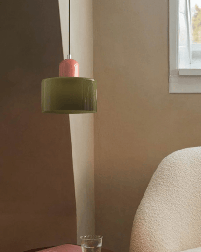 Modern pendant lamp featuring a soft glass shade in earthy tones, showcasing a sculptural design that adds a contemporary touch to any space. 6