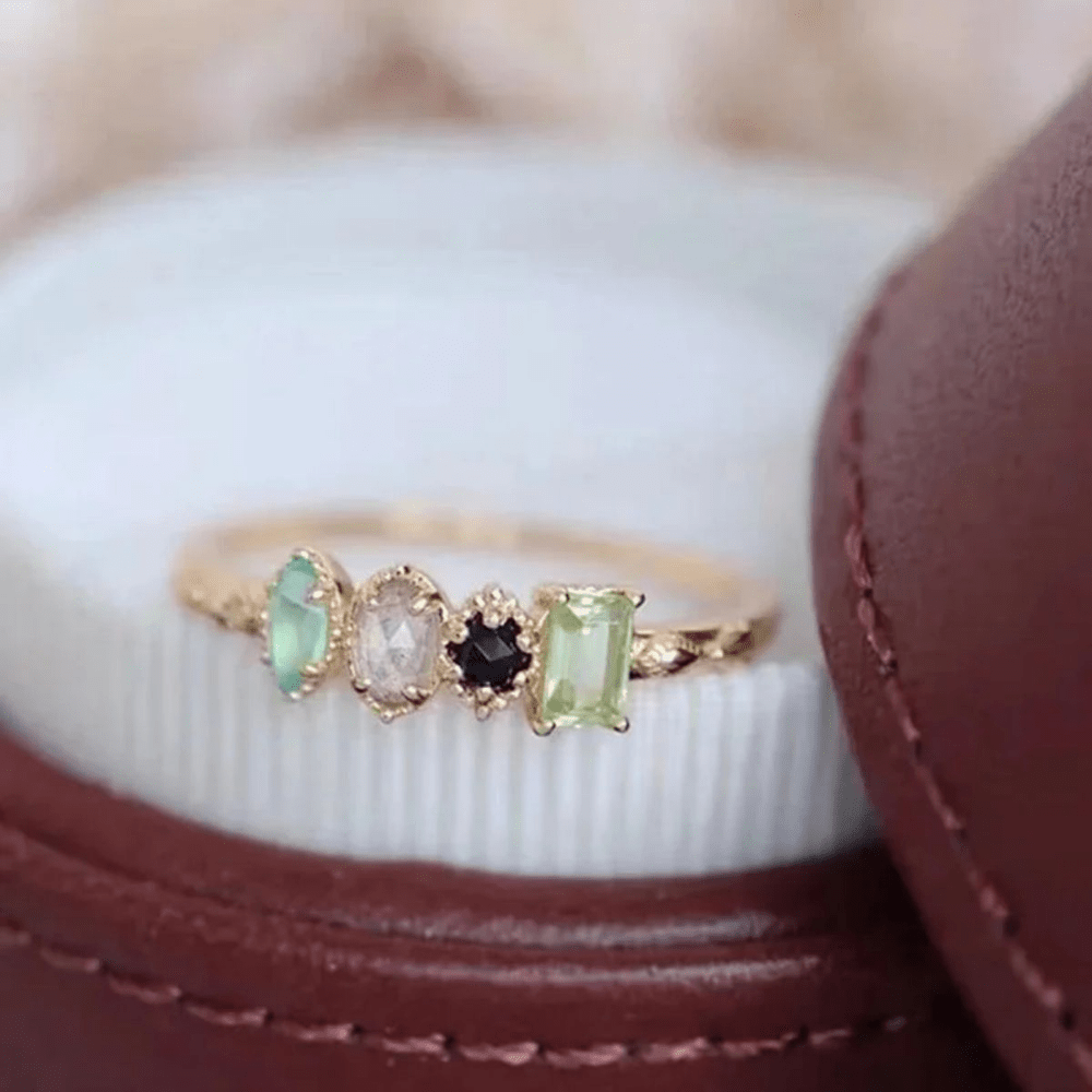 Personalized birthstone ring featuring a vintage milgrain design, customizable for family jewelry, showcasing unique birthstones in a beautiful setting. 6