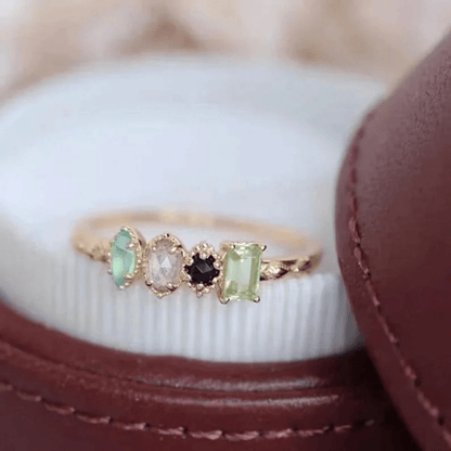 Personalized birthstone ring featuring a vintage milgrain design, customizable for family jewelry, showcasing unique birthstones in a beautiful setting. 6