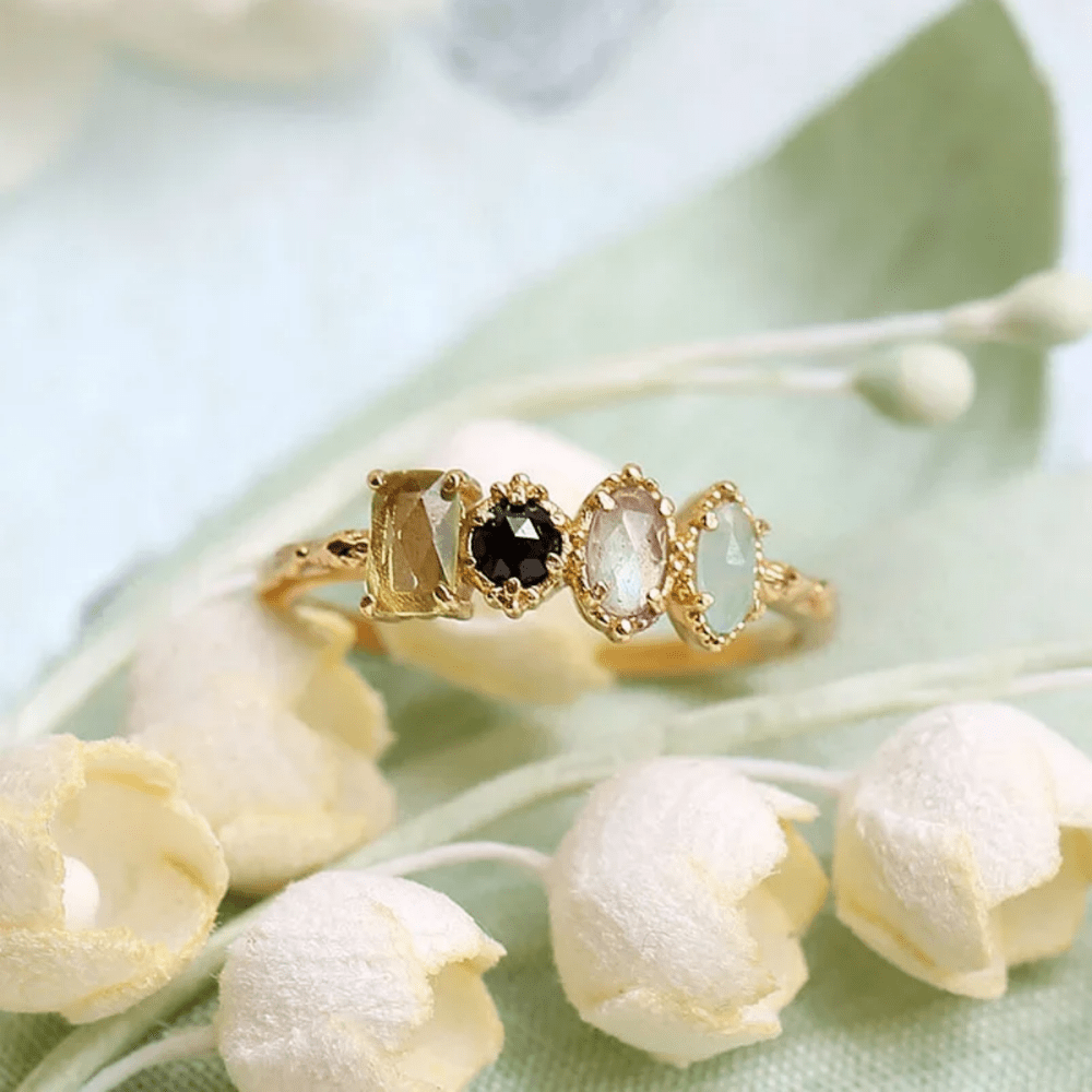 Personalized birthstone ring featuring a vintage milgrain design, customizable for family jewelry, showcasing unique birthstones in a beautiful setting. 2