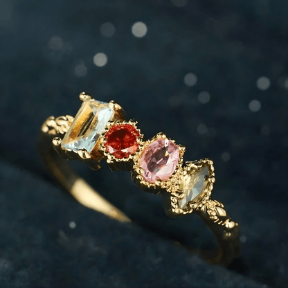 Personalized birthstone ring featuring a vintage milgrain design, customizable for family jewelry, showcasing unique birthstones in a beautiful setting. 1