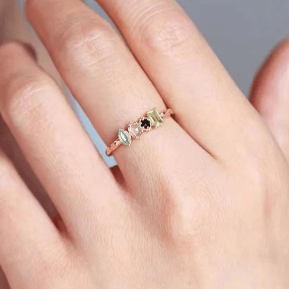Personalized birthstone ring featuring a vintage milgrain design, customizable for family jewelry, showcasing unique birthstones in a beautiful setting. 4