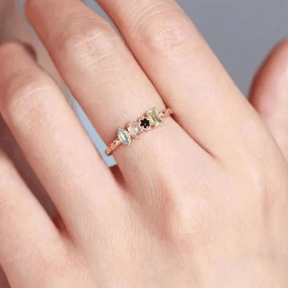 Personalized birthstone ring featuring a vintage milgrain design, customizable for family jewelry, showcasing unique birthstones in a beautiful setting. 4