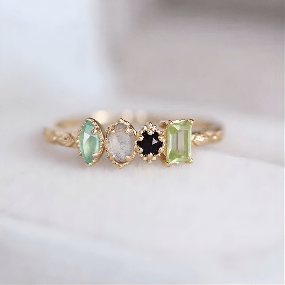 Personalized birthstone ring featuring a vintage milgrain design, customizable for family jewelry, showcasing unique birthstones in a beautiful setting. 3