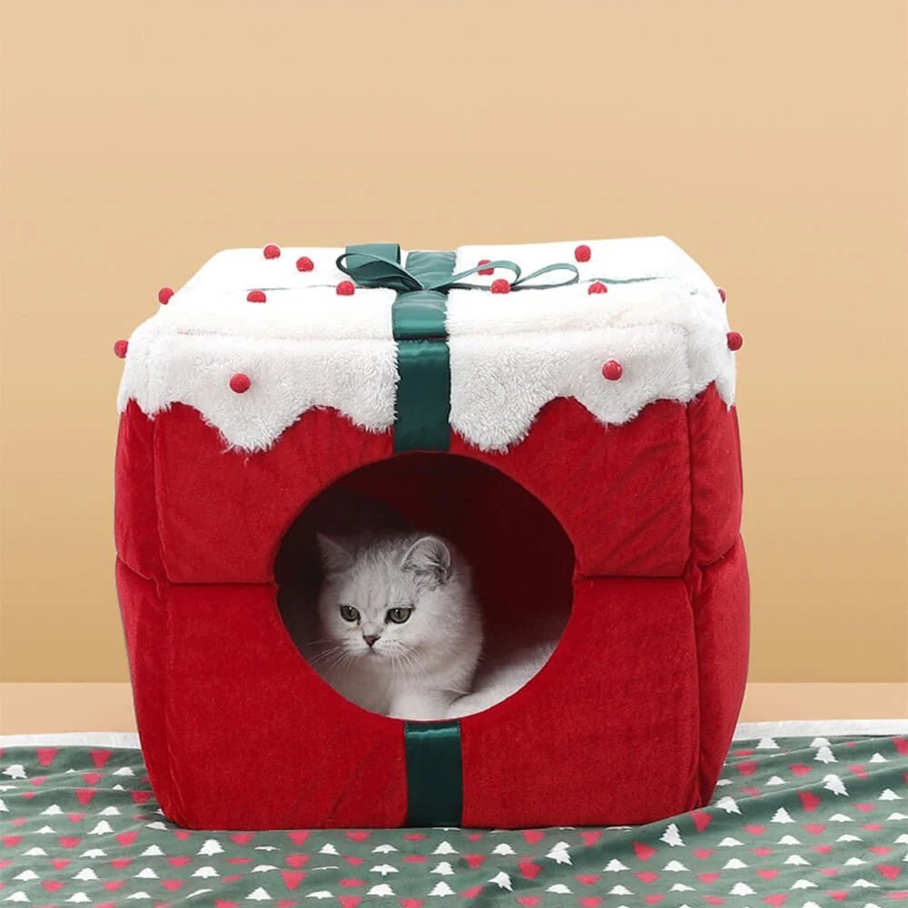 Cozy semi-enclosed pet bed for cats and small dogs, designed as a Christmas retreat with a non-slip base for stability. 7