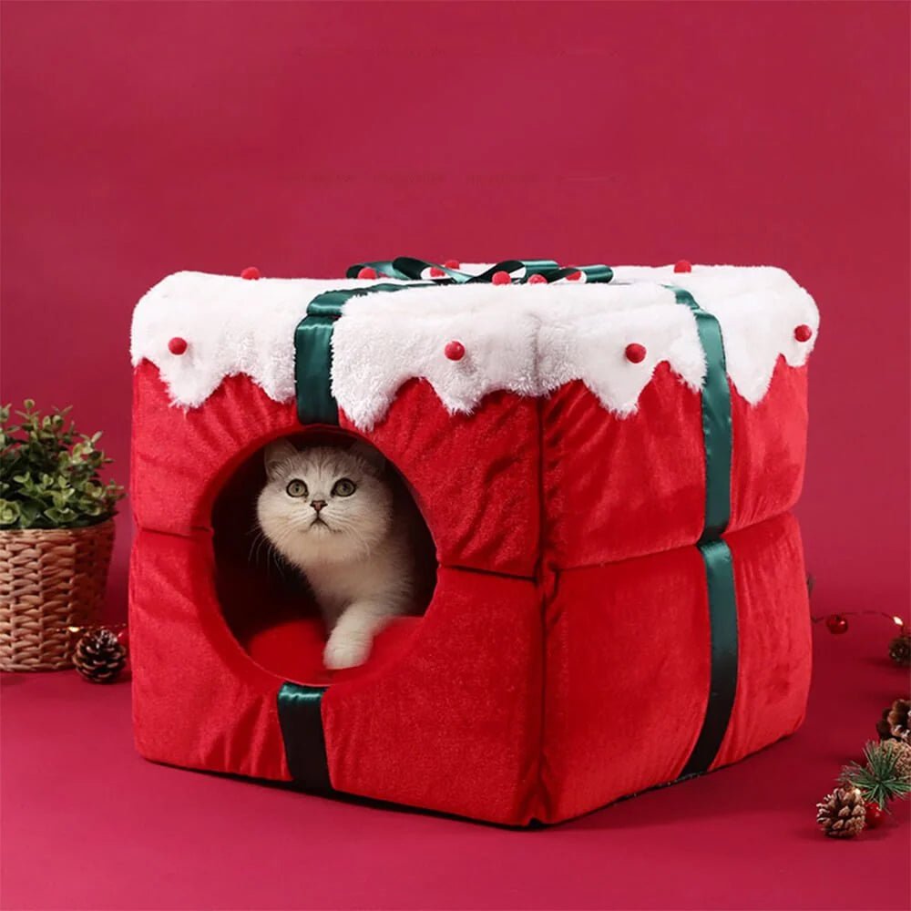 Cozy semi-enclosed pet bed for cats and small dogs, designed as a Christmas retreat with a non-slip base for stability. 0