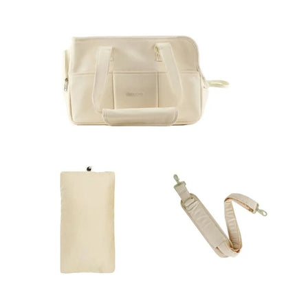 Lightweight pet carrier for cats and small dogs made from breathable cotton material, featuring a compact design ideal for travel. 7