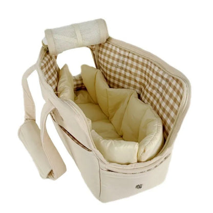 Lightweight pet carrier for cats and small dogs made from breathable cotton material, featuring a compact design ideal for travel. 5