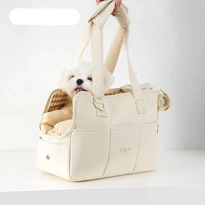 Lightweight pet carrier for cats and small dogs made from breathable cotton material, featuring a compact design ideal for travel. 3