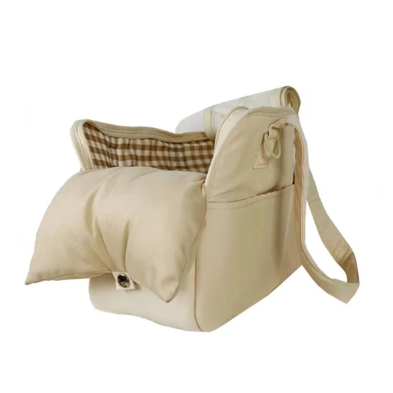 Lightweight pet carrier for cats and small dogs made from breathable cotton material, featuring a compact design ideal for travel. 0