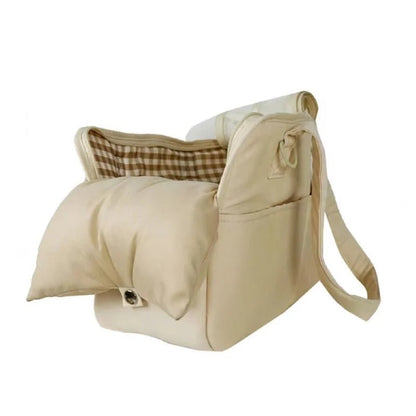 Lightweight pet carrier for cats and small dogs made from breathable cotton material, featuring a compact design ideal for travel. 0