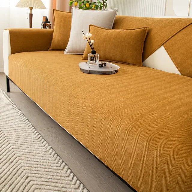 Pet-friendly sofa cover featuring a non-slip bottom, made from durable washable fabric, designed for stain and scratch protection, ideal for homes with pets. 4