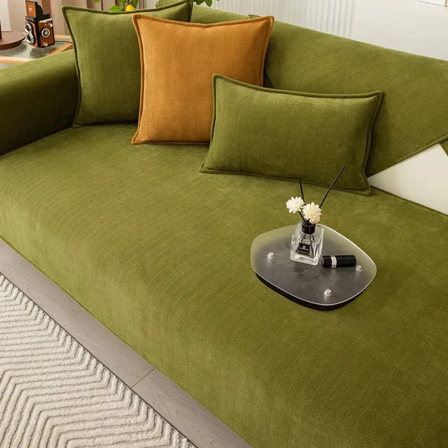 Pet-friendly sofa cover featuring a non-slip bottom, made from durable washable fabric, designed for stain and scratch protection, ideal for homes with pets. 7