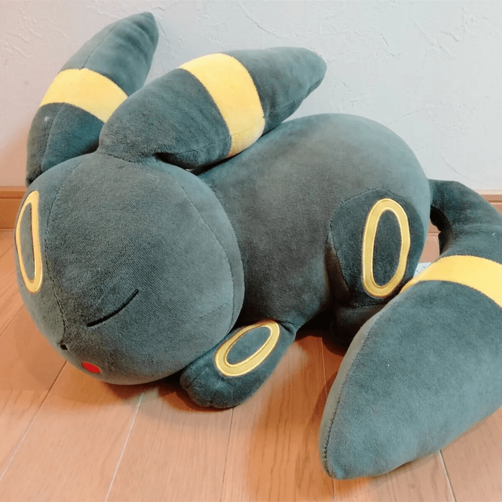 Plush black cat sleeping doll, soft stuffed animal ideal for cozy comfort and cuddling. 0