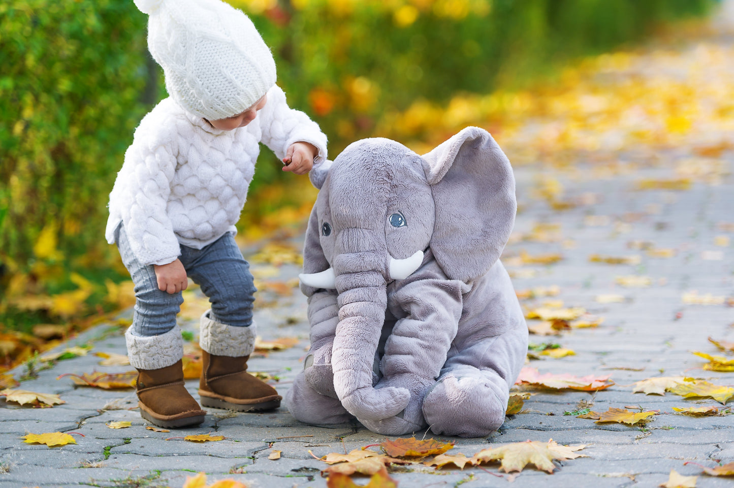 Plush elephant pillow for kids, perfect for cuddling and playtime, featuring super-soft comfort cushion, available in two sizes. 2