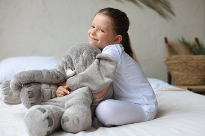 Plush elephant pillow for kids, perfect for cuddling and playtime, featuring super-soft comfort cushion, available in two sizes. 3