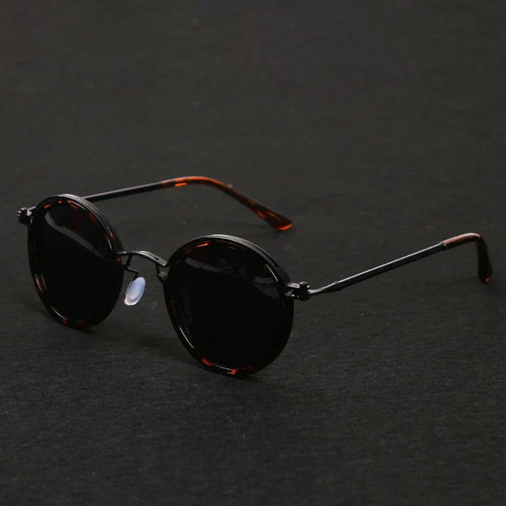 Polarized sunglasses featuring UV400 protection, designed with a lightweight modern style, perfect for outdoor activities like hiking, biking, and beach outings. 5