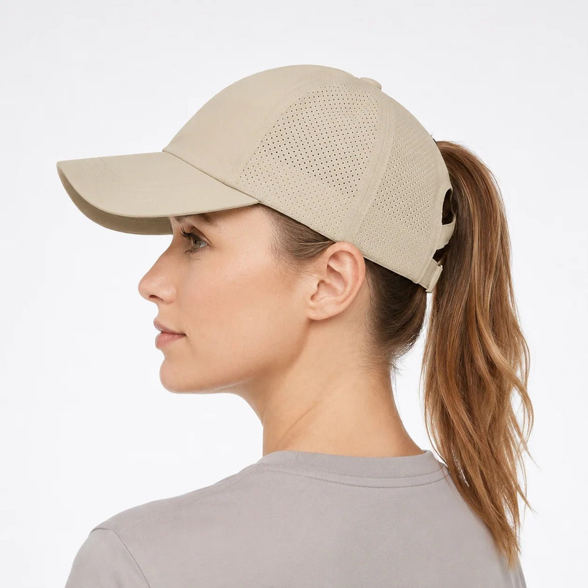 Women's ponytail sports cap featuring an adjustable fit and stylish crossback design, available in solid colors, perfect for active lifestyles and outdoor activities. 9