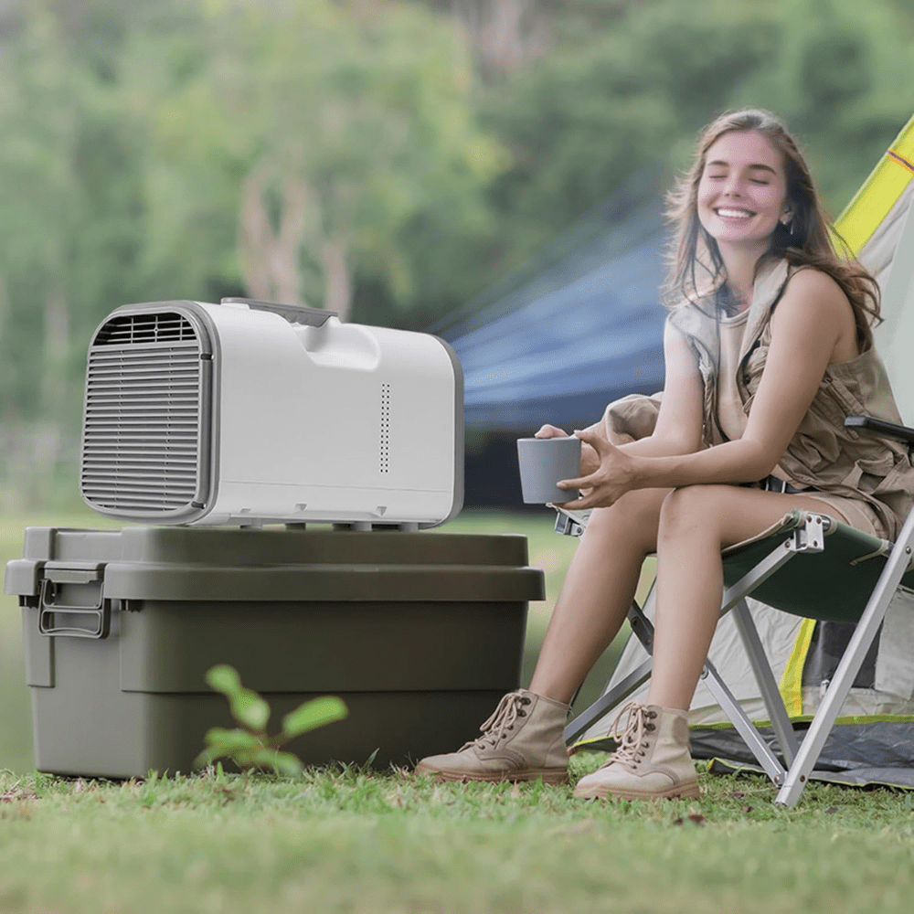 Portable air conditioner 4250 BTU with multi-function design, ideal for camping and travel, showcasing a compact cooling unit perfect for small spaces. 1