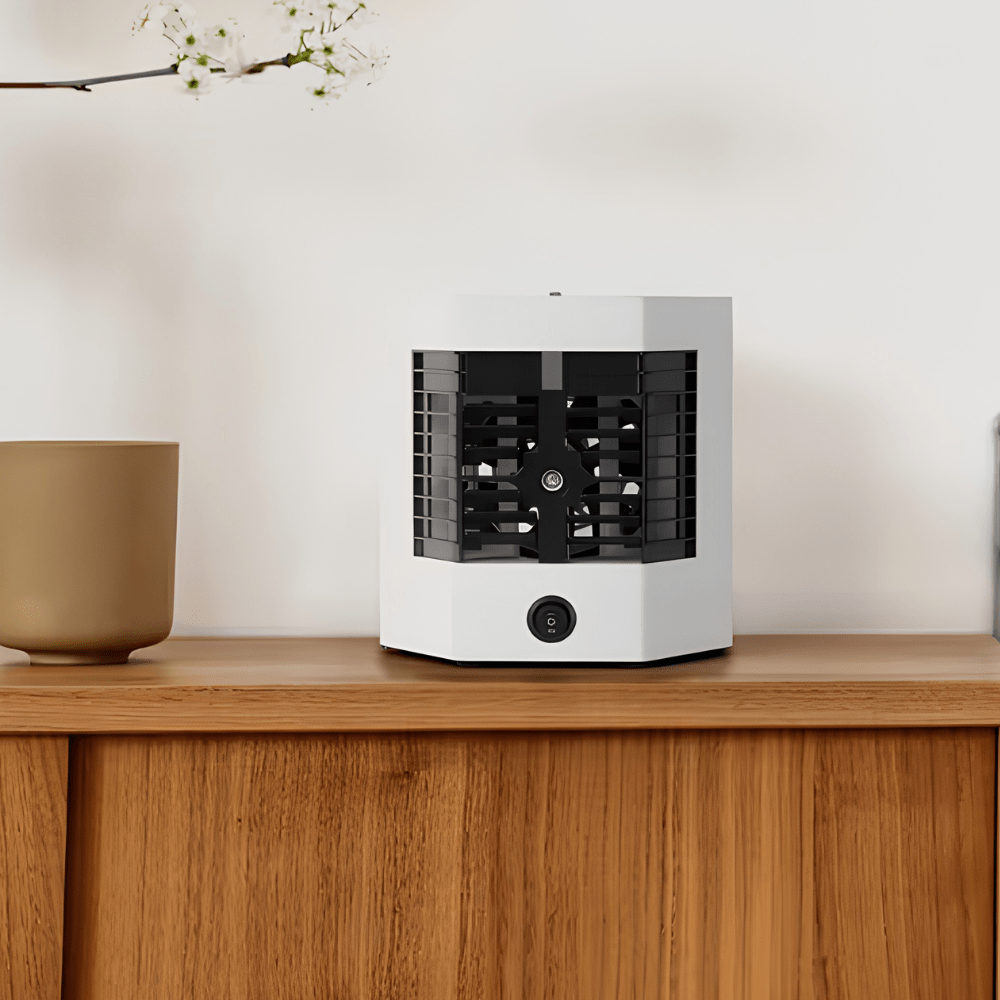 Portable air conditioner fan featuring fast ice cooling technology, designed as a compact, USB-powered mini cooling device for personal use. 1