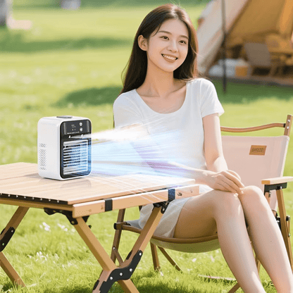 Portable air conditioner fan with rechargeable battery, featuring adjustable speed settings, compact design, and USB connectivity, ideal for home and travel use. 3