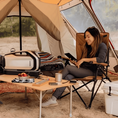 Portable air conditioner with rechargeable battery, designed for outdoor use, featuring a compact and lightweight design ideal for camping and travel. 1