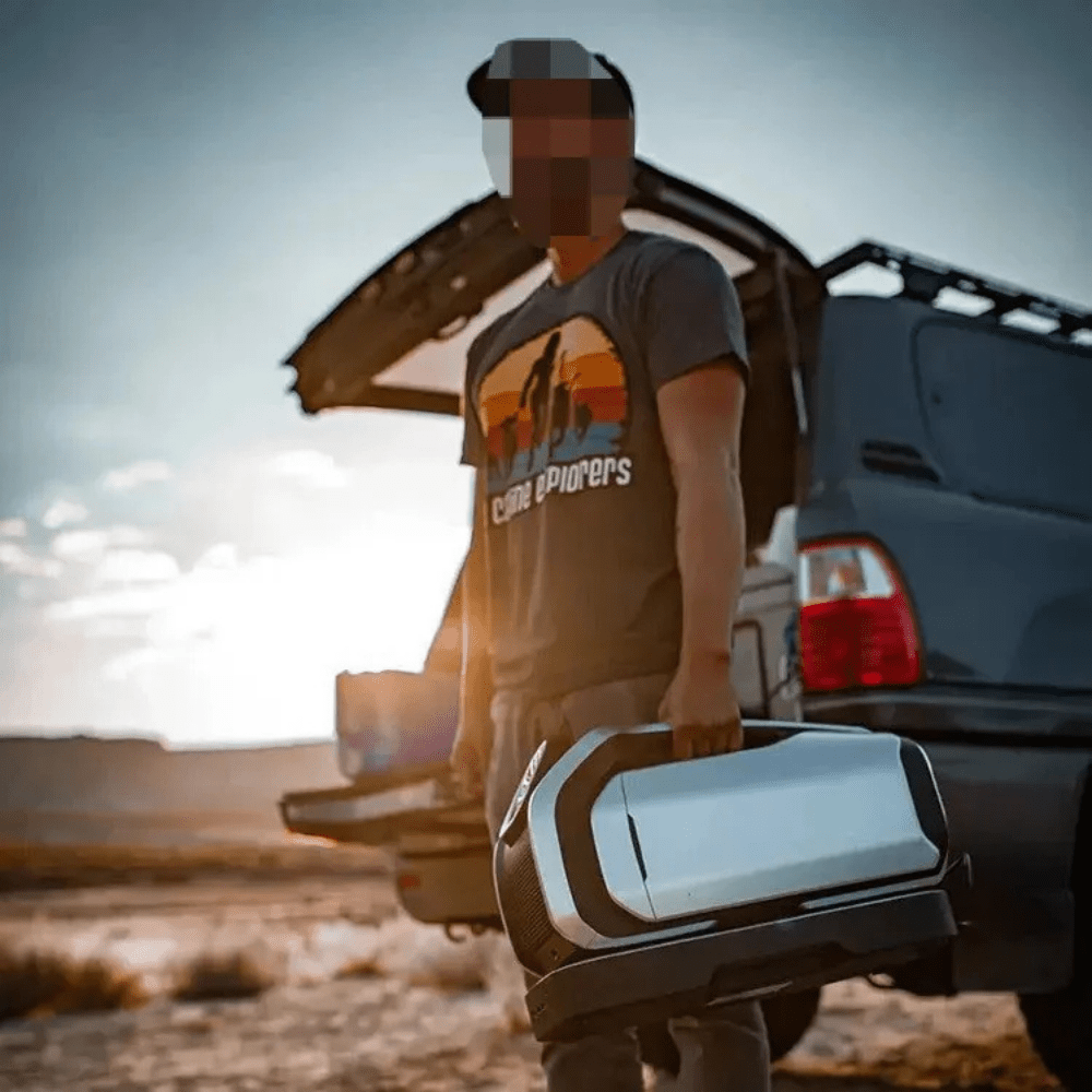 Portable air conditioner with rechargeable battery, designed for outdoor use, featuring a compact and lightweight design ideal for camping and travel. 4