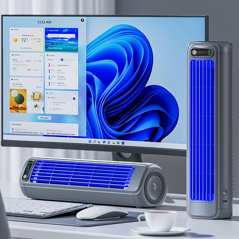Portable air cooler with a rechargeable battery in a compact bladeless design, featuring a sleek grey finish and capable of providing up to 12 hours of cooling 4