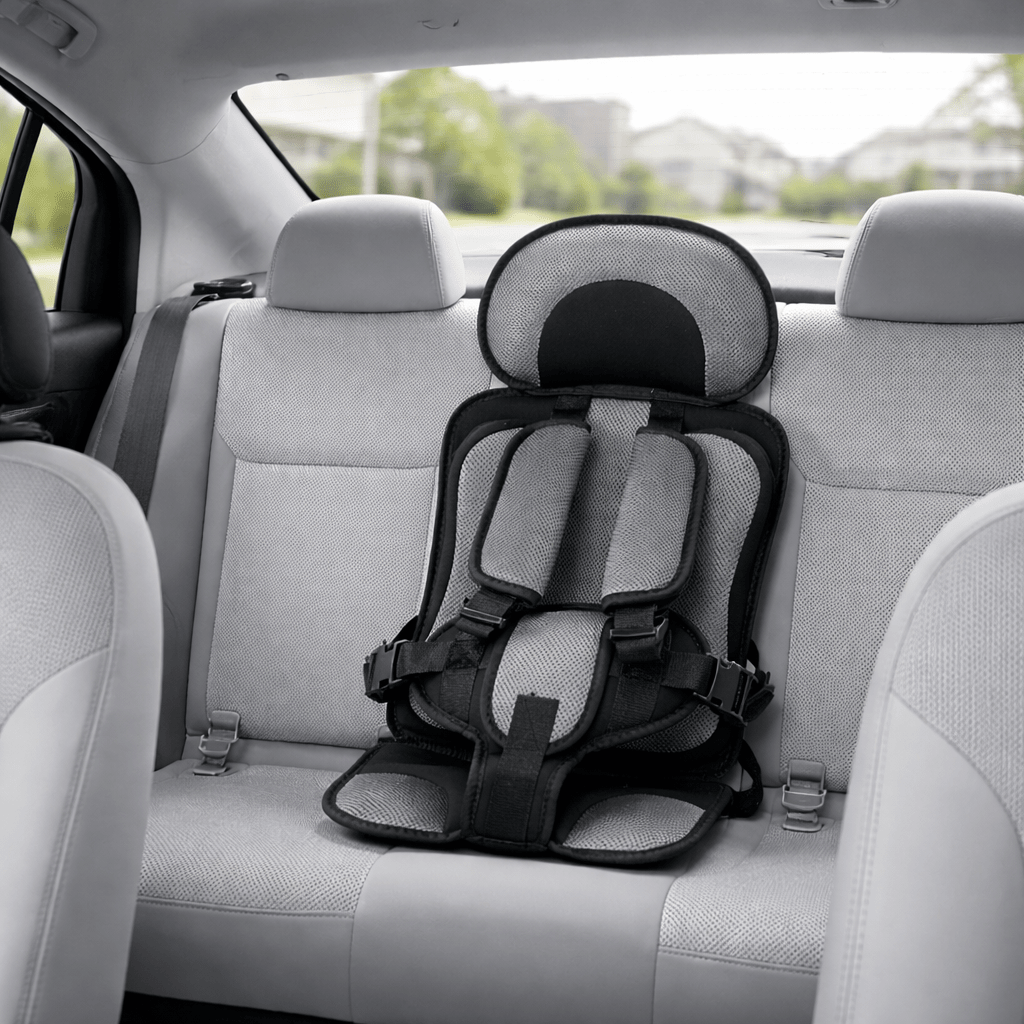 Portable booster seat for children featuring cushioned support, designed for safety and comfort during travel, lightweight for easy installation. 9