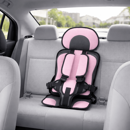 Portable booster seat for children featuring cushioned support, designed for safety and comfort during travel, lightweight for easy installation. 4