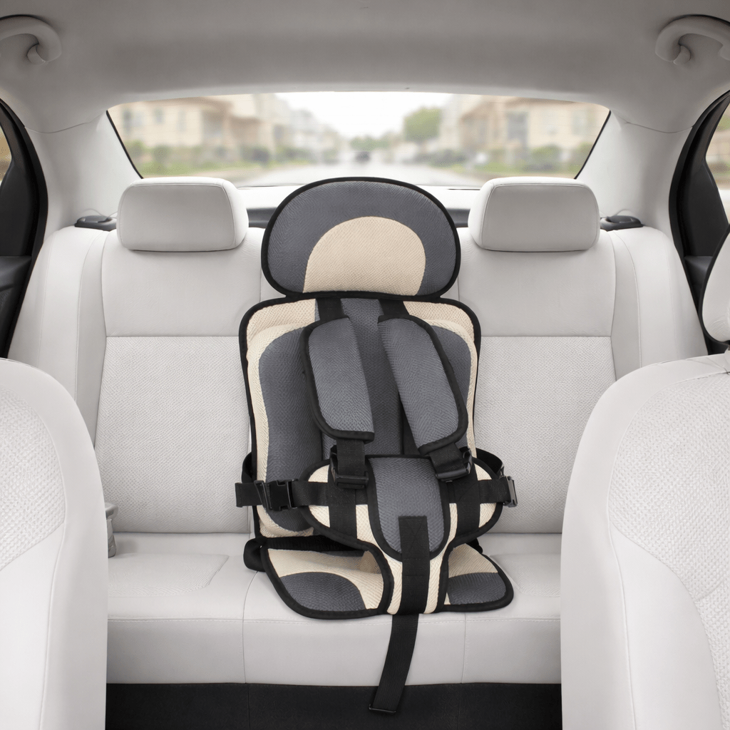 Portable booster seat for children featuring cushioned support, designed for safety and comfort during travel, lightweight for easy installation. 6