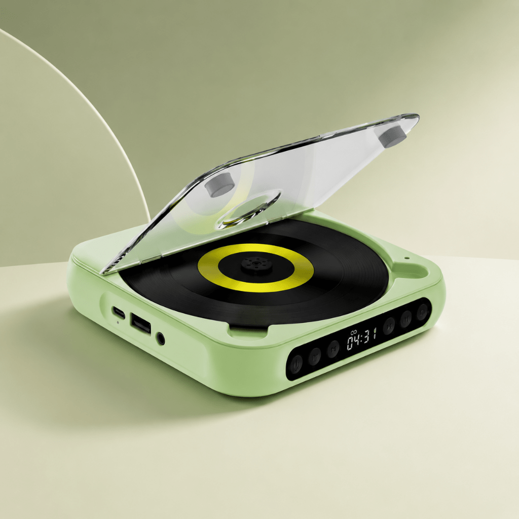 Portable CD player featuring Bluetooth connectivity and a rechargeable battery, designed with a slim and compact profile for easy portability. 3